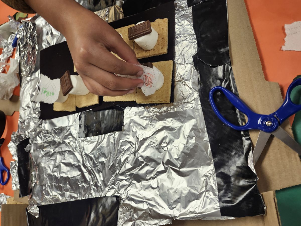 Students collaborating on a hands-on science build